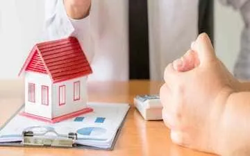 Quais são os seguros patrimoniais? Na imagem, representação de um imóvel em alusão à importância de empresas contratarem o seguro patrimonial empresarial.