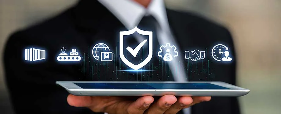 Seguro para CNPJ é mais barato? Na imagem, homem segurando tablet com ícones que representam tipos de seguros no grupo de riscos especiais